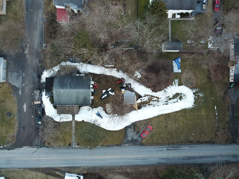 Building a 250 Yard Snowmobile Track around his house?